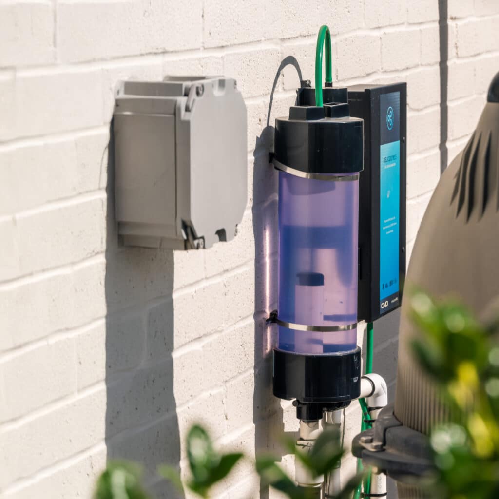 Pool Chemical Feeder and Control System Mounted on Exterior Wall