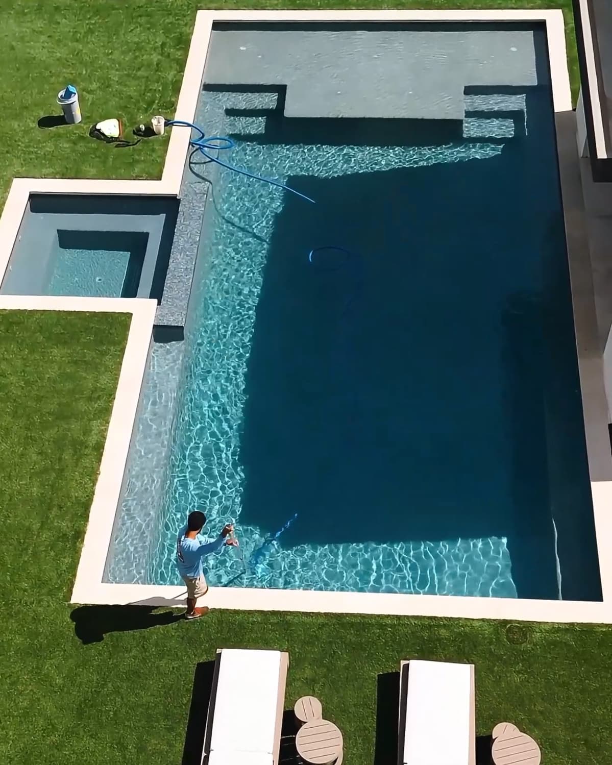 Weekly Pool Maintenance Being Conducted by Safari Pools Service Technician